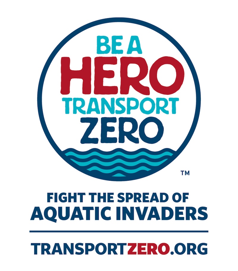 A circular logo with text underneath. The circle has the text "Be A Hero Transport Zero" inside. Text underneath the circle says, "Fight the spread of Aquatic invaders, transportzero.org."