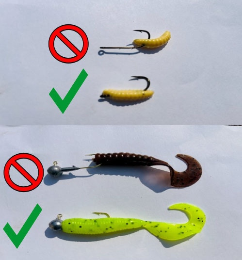 A diagram showing fishing hooks and plastic worms. A green checkmark indicates the correct way to place a worm on a hook, and a red circle with a line through it indicates the incorrect method with most of the worm dangling off the hook.